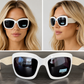 DC-226-Modische Sonnenbrille-für Damen, mit großen Gläsern und aussergewöhnlichem Bügeldesign.